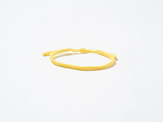 Yellow Woven String Bracelet - Handmade at Sangha House