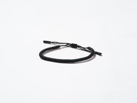 Black Woven String Bracelet - Handmade at Sangha House